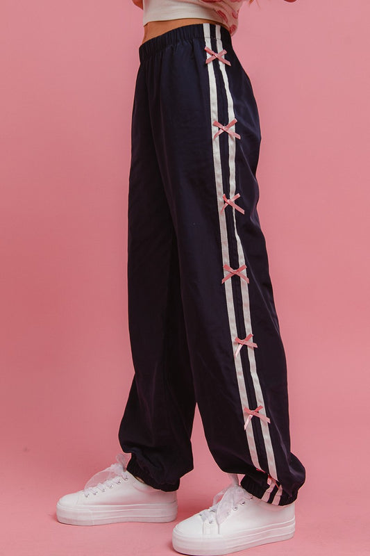 Side Lines And Bow Embellished Track Pants